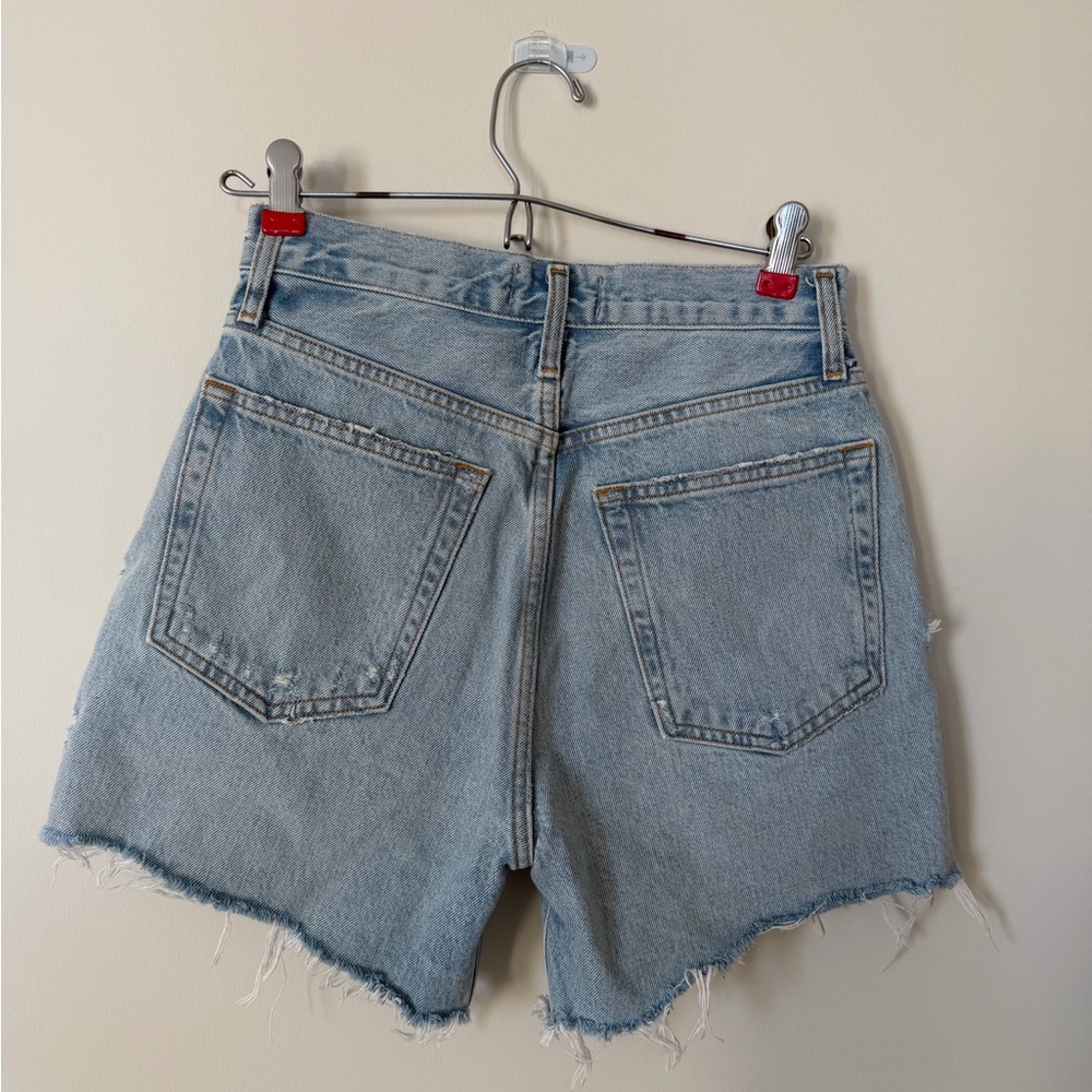 Agolde Riley Light Blue Ripped Jean Shorts - Picture 3 of 4